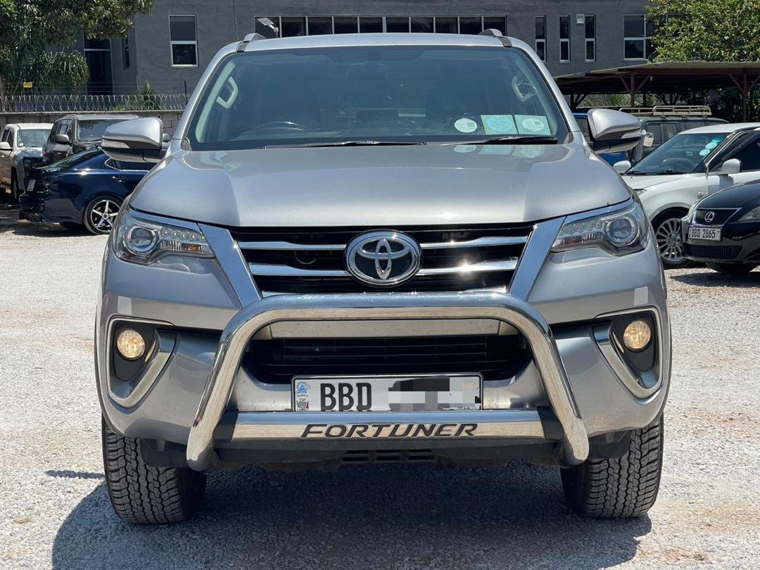 Front view of the silver Toyota Fortuner showing the grille and bull bar