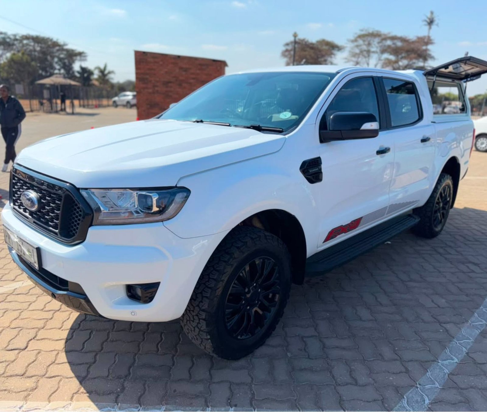 A white Ford Ranger FX4 double cab from the Local Legends fleet